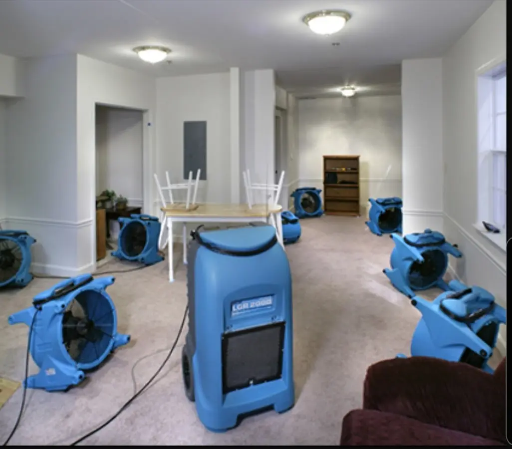 Air movers and dehumidifier setup for Water Damage Restoration in Gretna